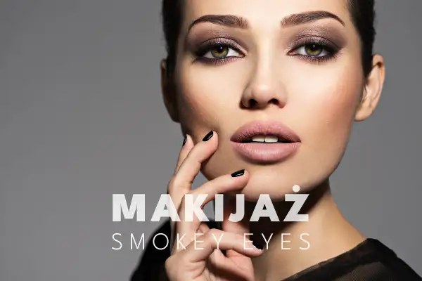 Kobieta z hipnotyzującym makijażem smoky eyes, zmysłowo dotyka ust.