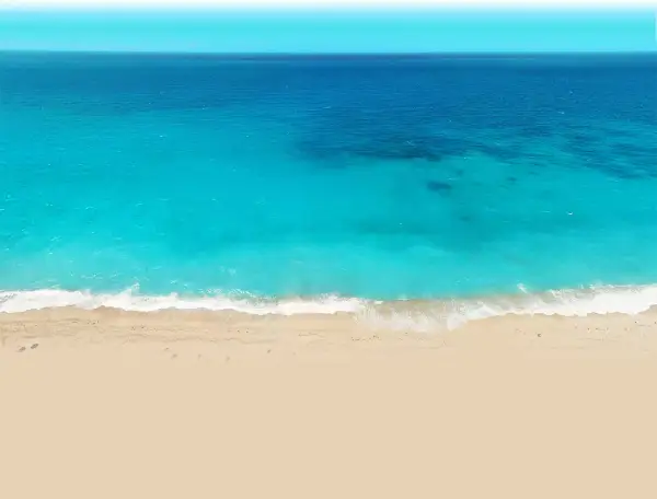 Vista aérea de una playa de arena dorada y aguas turquesas, como las de el palmer almeria, con olas rompiendo suavemente.