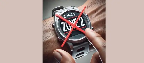 Montre connectée affichant "ZONE 2" barré de rouge. Fin de l'entraînement en zone 2.