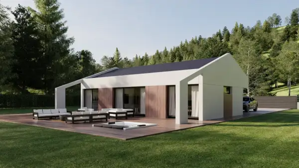 Moderna casa con cubierta a dos aguas, terraza con jacuzzi y muebles de exterior, rodeada de un jardín y un bosque.