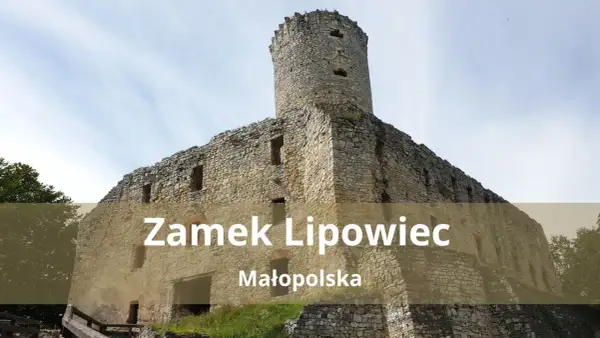 Kamienne ruiny Zamku Lipowiec w Małopolsce, z charakterystyczną wieżą i murami obronnymi, górują nad zielonym krajobrazem.