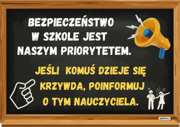 Czarna tablica z napisem "Bezpieczeństwo w szkole jest naszym priorytetem. Jeśli komuś dzieje się krzywda, poinformuj o tym nauczyciela.