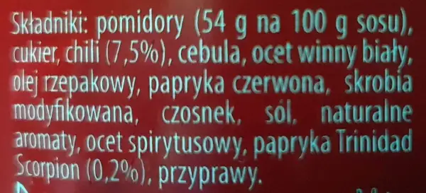 Sos z pomidorów, cukru, cebuli, czosnku i papryki Trinidad Scorpion (0,2%) z nutą chili.