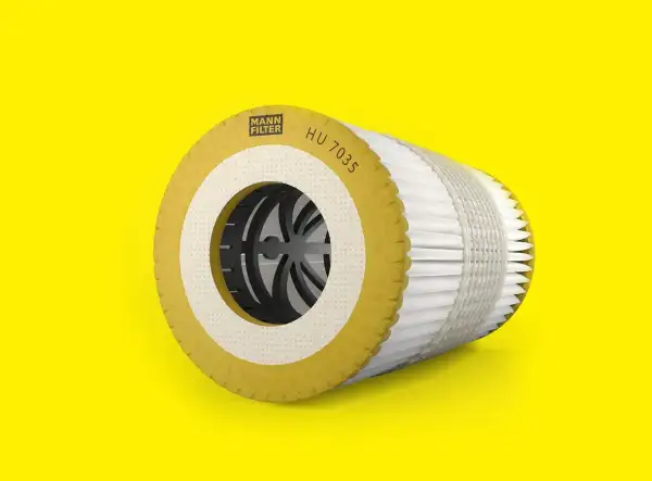 Mann Filter Ölfilter-Kartusche HU 7035 auf gelbem Hintergrund.