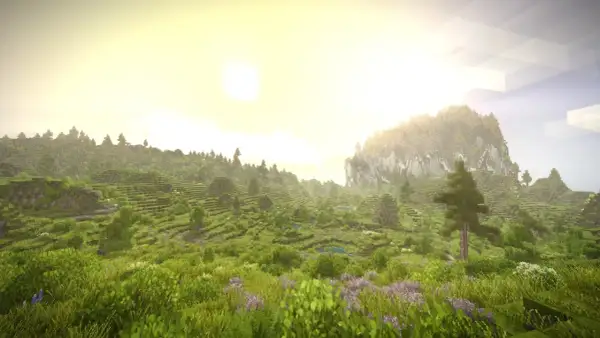Zielona, tarasowa dolina z kwitnącymi kwiatami, gdzie słońce wschodzi nad górą. Jakby z **vintage story steam**.