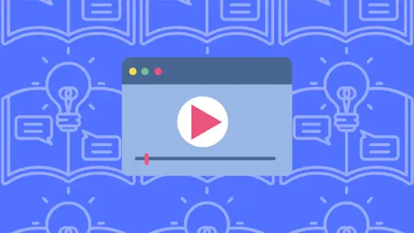 Otwarta książka z żarówką i dymkami dialogowymi. Obok odtwarzacz wideo. To idealny motyw, o czym można napisać opowiadanie.