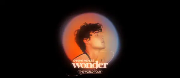 Shawn Mendes Wonder The World Tour – artystyczny portret artysty w ciepłym świetle.