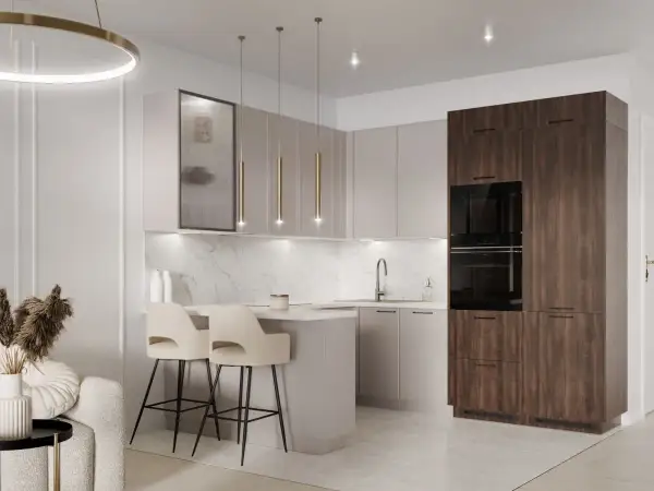 Elegancka kuchnia modern classic z wyspą, dwoma hokerami i wysoką zabudową z piekarnikami.