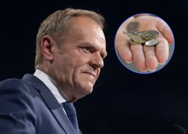 Polityk w garniturze i dłoń z monetami, sugerujące dyskusję o podatku emisyjnym.
