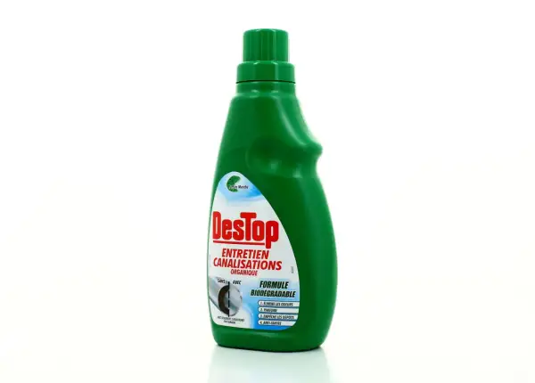 Bouteille verte de Destop Entretien Canalisations Organique, formule biodégradable. Est-ce que le Destop abîme les canalisations ? Ce produit est conçu pour les entretenir.