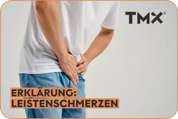 Mann hält sich die Leiste, wo ist die Leiste? Erklärung: Leistenschmerzen. TMX Logo.