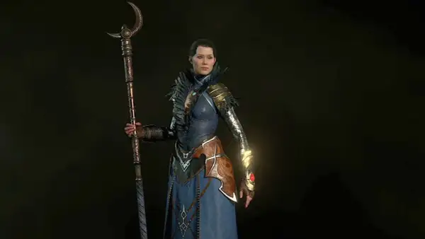 Czarodziejka z Diablo 2, gotowa do walki z potężnym kosturem. Jej strój sugeruje potężny diablo 2 czarodziejka build.