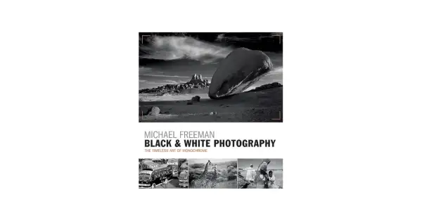 Michael Freeman's "Black & White Photography" showcases the timeless art of monochrome. This cover features a dramatic desert landscape and smaller images of buses, giraffes, and people.