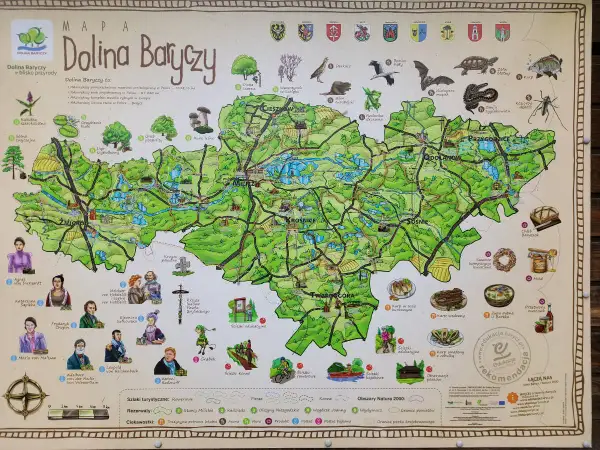 Mapa **parku krajobrazowego Dolina Baryczy** z zaznaczonymi atrakcjami przyrodniczymi, historycznymi i kulturalnymi.