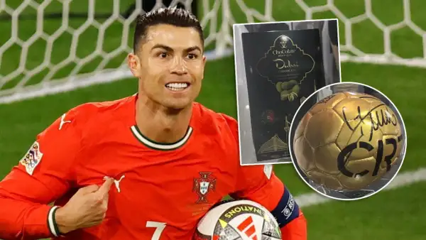 Cristiano Ronaldo w stroju Portugalii z piłką i czekoladkami z Dubaju. Zastanawiasz się, ile kosztuje Ronaldo?
