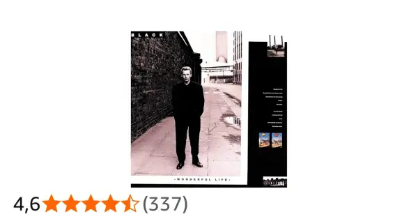 Okładka albumu "Wonderful Life" zespołu Black. Mężczyzna w czarnym garniturze stoi na ulicy.
