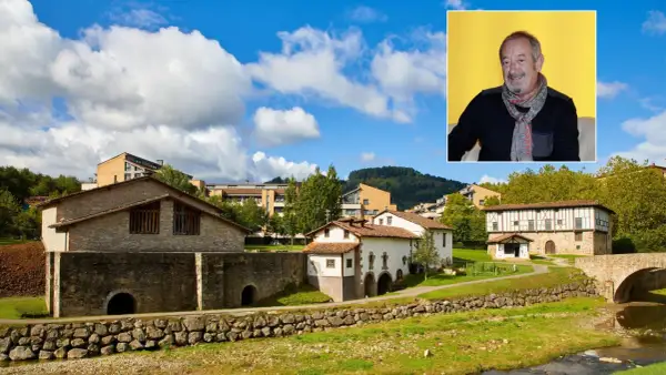 Paisaje vasco con casas tradicionales y modernas, y un retrato de Karlos Arguiñano, mostrando de donde es Arguiñano.
