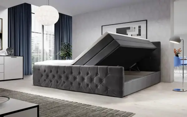 Modernes Boxspringbett mit Stauraum. Der Bezug ist aus grauem Samt, die Matratze ist hochgeklappt. Vielleicht ist das Boxspringbett zu hart?
