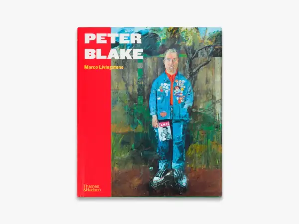 Book cover featuring a painting of Peter Blake in a denim jacket adorned with badges, holding an Elvis Presley magazine.