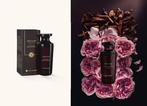Flakon perfum Rose Oud Yves Rocher otoczony płatkami róż i drewnem oud.
