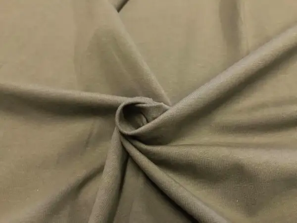 Miękka, elastyczna tkanina single jersey w kolorze khaki, idealna na koszulki.