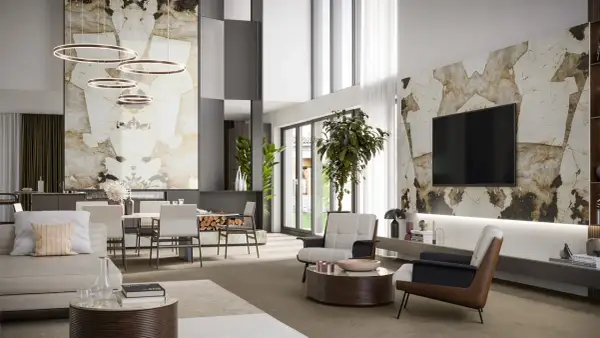 Elegante salotto e sala da pranzo con pareti in pietra naturale, mobili moderni e illuminazione a sospensione.