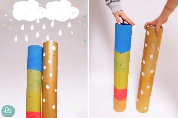 Kinder basteln Regenmacher aus Papprollen. Bunte Farben und kleine Nägel erwecken die Instrumente zum Leben.