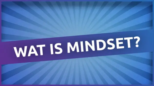 Een ander woord voor mindset is instelling. De tekst "WAT IS MINDSET?" staat op een paarse band tegen een blauwe achtergrond met stralen.