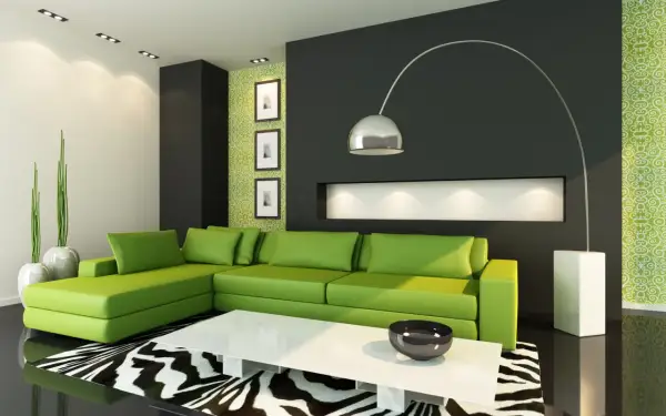 Nowoczesny salon z kanapą w odcieniu **kolor limonkowy**, czarną ścianą i zieloną tapetą.