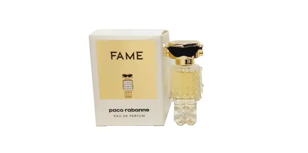 Paco Rabanne Fame – flakonik perfum i pudełko z motywem ikonicznej postaci w okularach przeciwsłonecznych.