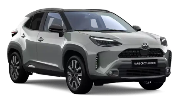 Srebrny Toyota Yaris Cross Hybrid 2025 z czarnym dachem, nowoczesnymi światłami LED i masywnymi zderzakami.