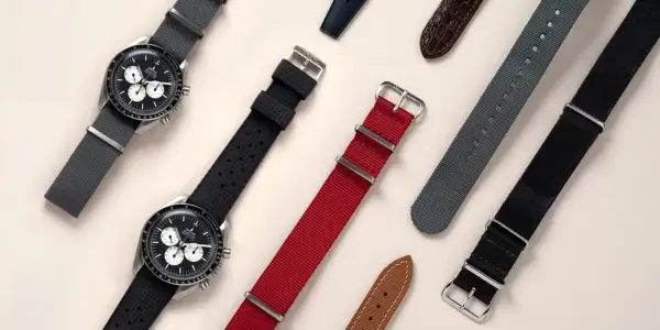 Variedad de tipos correa reloj: gris, negro de caucho, rojo, gris de nylon, negro de nylon y marrón de piel.