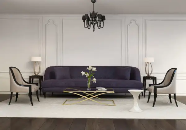 Elegancka sofa i fotele tworzą przytulną przestrzeń w klasycznych wnętrzach.