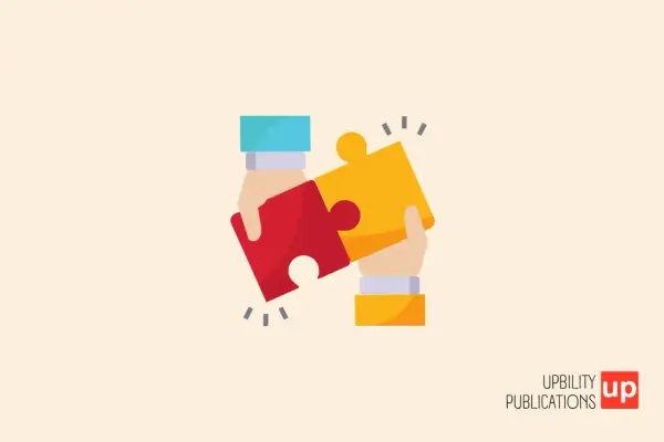 Due mani uniscono due pezzi di puzzle, simboleggiando l'unione e la comprensione per la sindrome di Down e l'autismo.