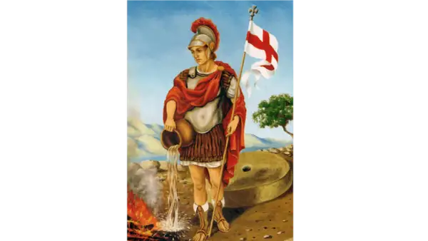 Św. Florian, patron strażaków, gasi płomienie wodą z dzbanka, symbolizując swoją odwagę i pomoc w obliczu ognia.