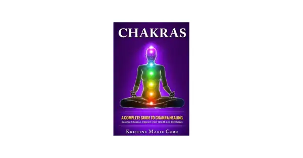 Okładka książki "Chakras" z sylwetką w pozie medytacyjnej i kolorowymi czakrami.