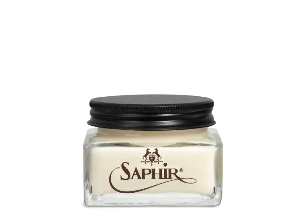 Crème pour le cuir napa Saphir dans un pot en verre avec un couvercle noir.