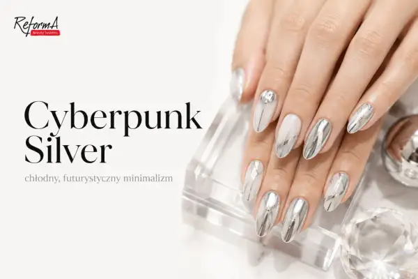 Dłonie z paznokciami w stylu "Cyberpunk Silver". Efekt lustra na paznokciach, chłodny, futurystyczny minimalizm.
