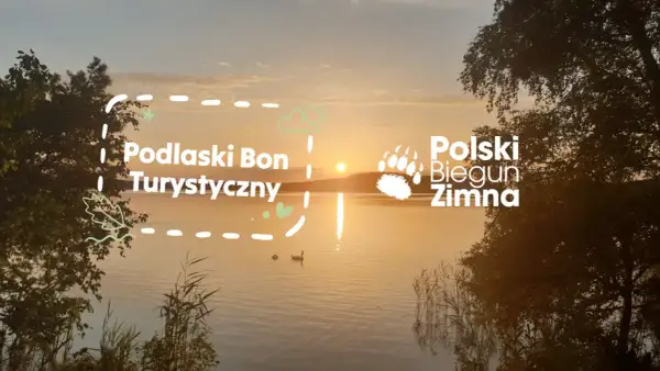 Zachód słońca nad jeziorem, z napisem "Podlaski Bon Turystyczny 2026" i "Polski Biegun Zimna".