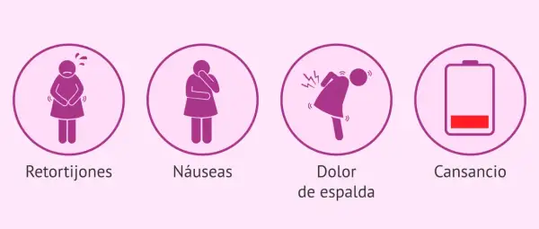 Síntomas comunes en embarazo de 39 semanas: retortijones, náuseas, dolor de espalda y cansancio.