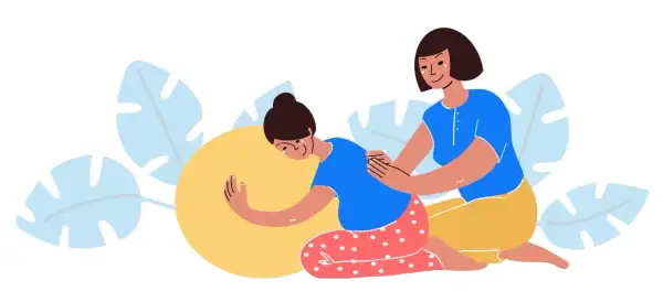 Una doula apoya a una mujer embarazada en una pelota de parto, ofreciendo consuelo y ayuda.