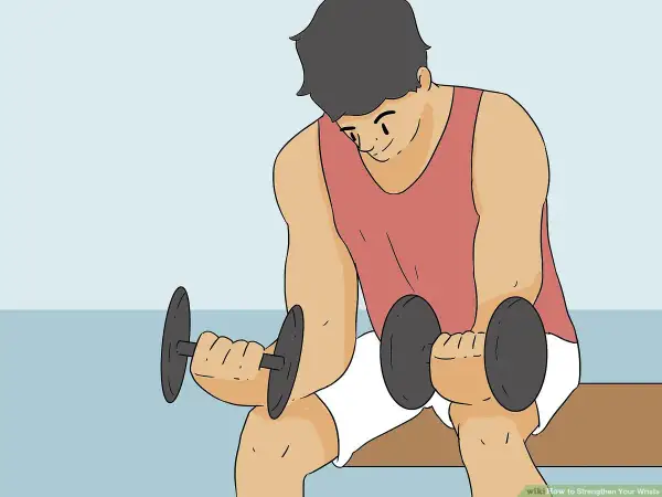 Man doing dumbbell wrist curls to learn how to get stronger wrists.