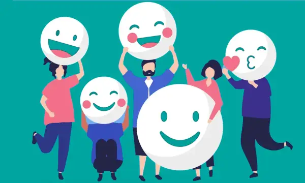 Personas celebrando con caras sonrientes, ideales para actividades para trabajar las emociones y fomentar la alegría.