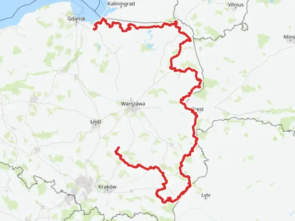 Mapa z zaznaczoną trasą rowerową R10, biegnącą od Bałtyku przez Warszawę i Kraków, ukazująca jej długość i przebieg.
