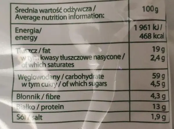 Tabela wartości odżywczych dla 100g produktu: energia, tłuszcz, węglowodany, błonnik, białko, sól.