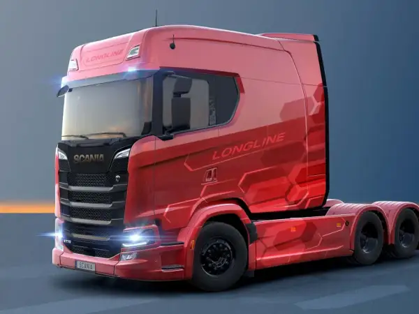 Camion rouge Scania S770 Longline, une cabine camion luxe aux lignes futuristes et aux détails hexagonaux.