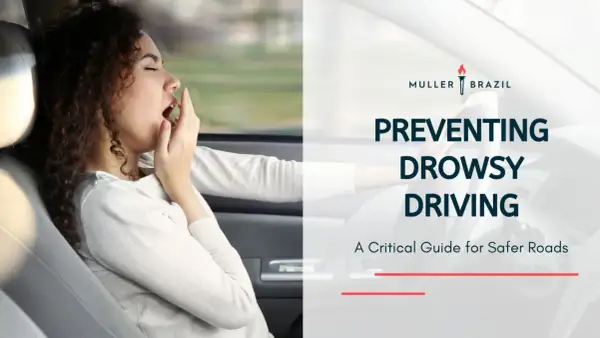 Preventing drowsy driving is crucial, especially for those with conditions like narcolepsy. This image shows a woman yawning while driving, highlighting the dangers.