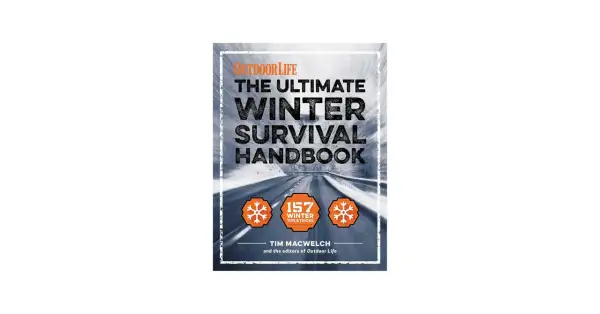 Okładka książki "The Ultimate Winter Survival Handbook" z drogą w zimowym krajobrazie.