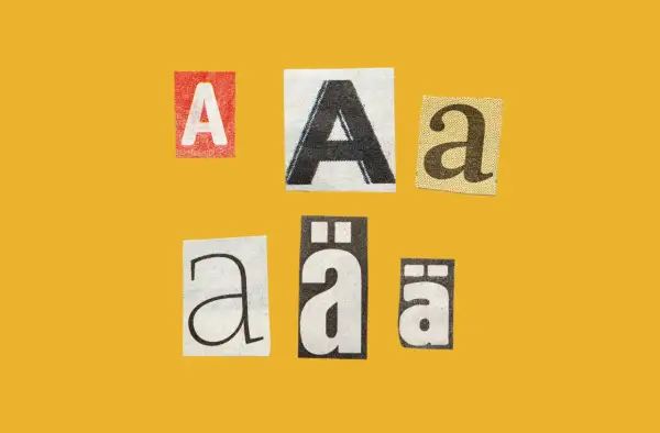 Collage of cut-out letters "A" and "a" in various fonts and colors, exploring font psychology.