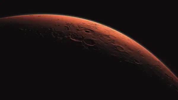Mars kraterlandskap i mörker. Medeltemperatur mars är extremt låg, långt under fryspunkten.
